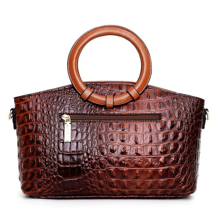 Concetta — Borsa Donna a Mano in Pelle Stampa Coccodrillo con Fiocco, Lina Milano