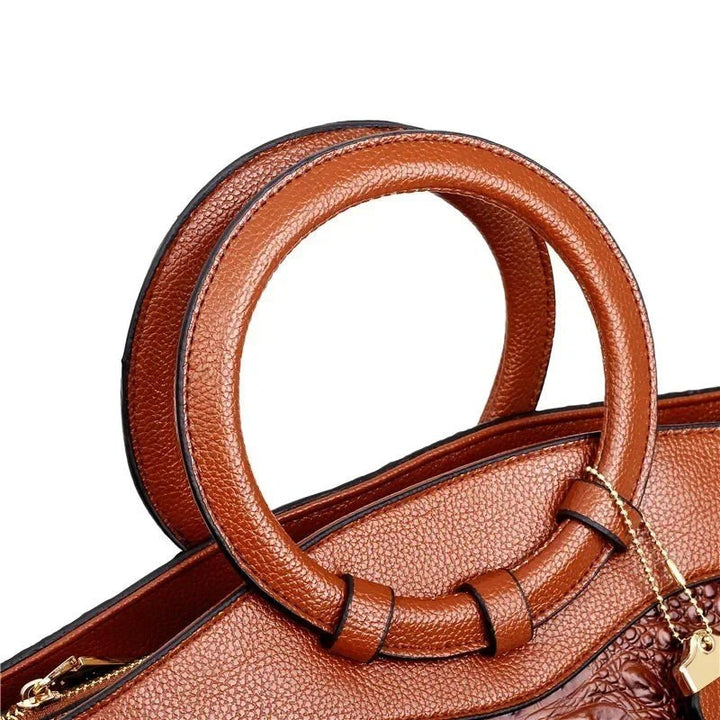 Concetta — Borsa Donna a Mano in Pelle Stampa Coccodrillo con Fiocco, Lina Milano